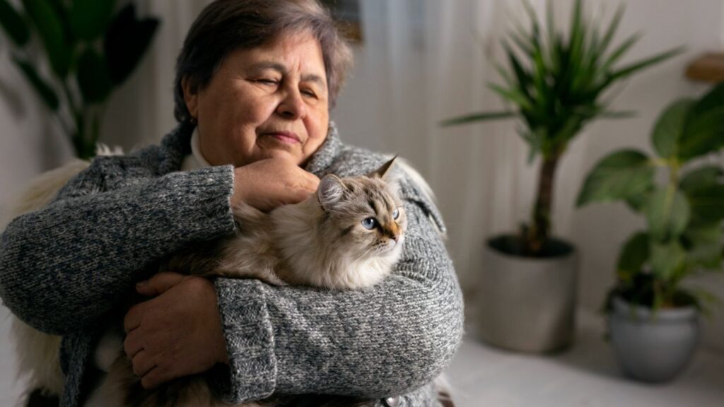 older woman with cat