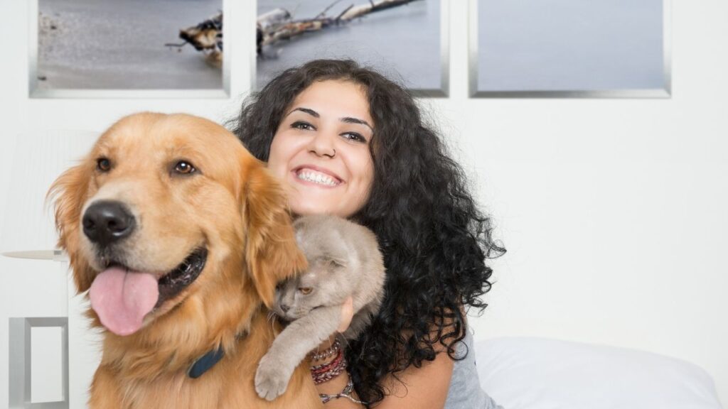 woman with dog and cat