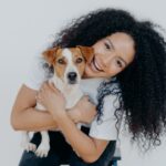 woman hug dog