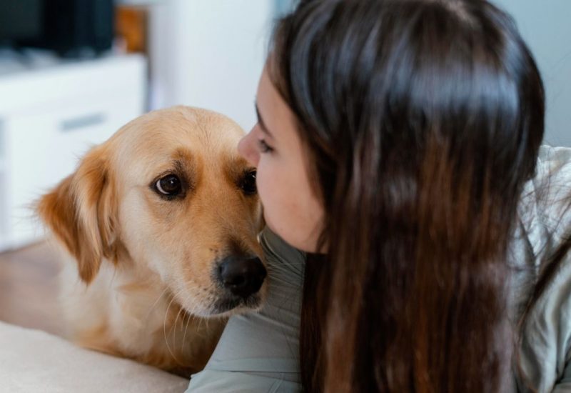 woman getting comfort from her ESA dog